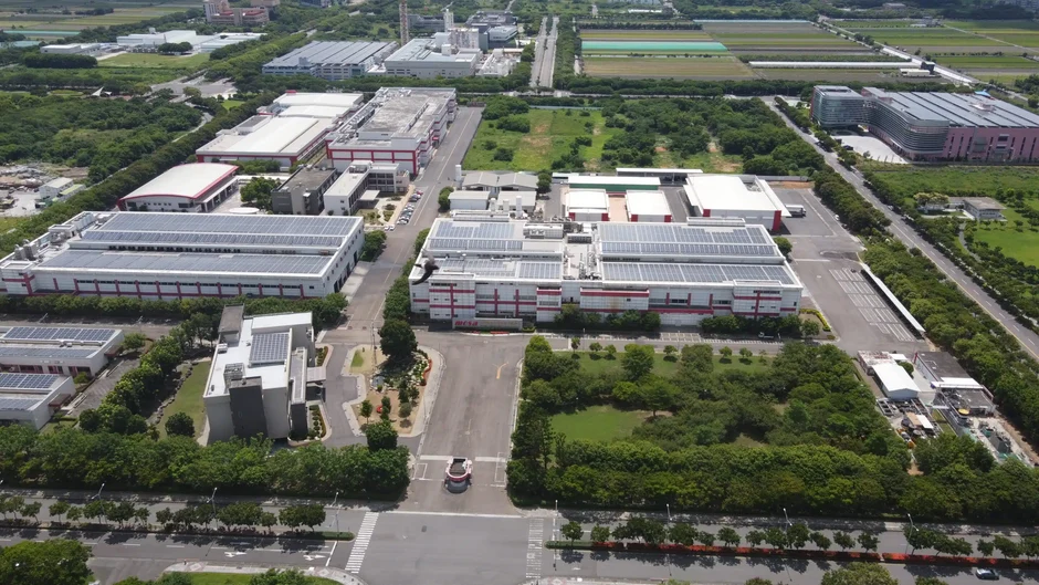 Aerial view of the MOSA manufacturing site with solar-panel roofs